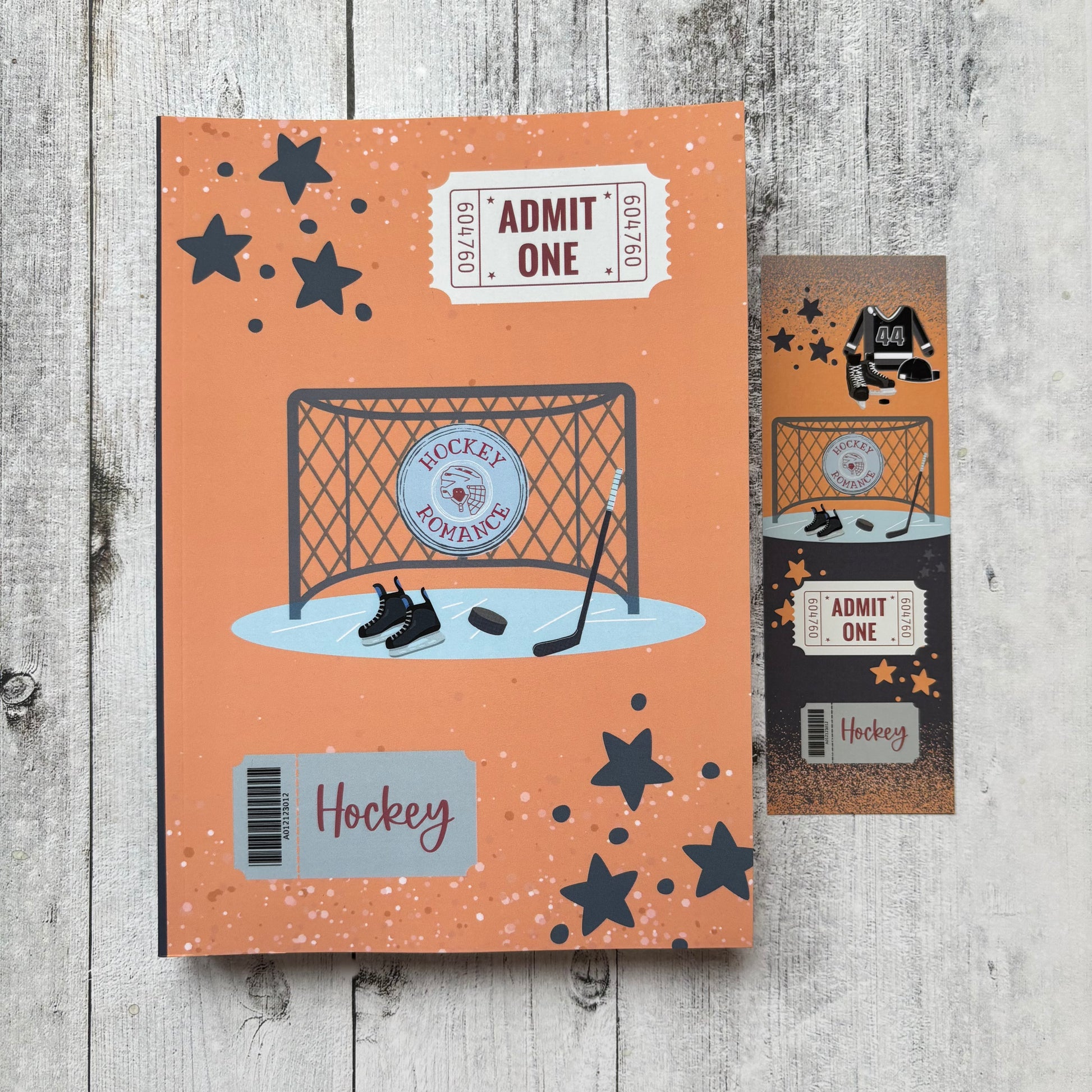 Hockey-themed reading journal with goal design on a wooden surface